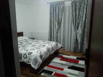 Фото номера Номер с кроватью размера «king-size» и балконом Фермерские дома Pensiunea Lucian г. Bălţaţi 6