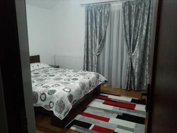 Фото номера Номер с кроватью размера «king-size» и балконом Фермерские дома Pensiunea Lucian г. Bălţaţi 11